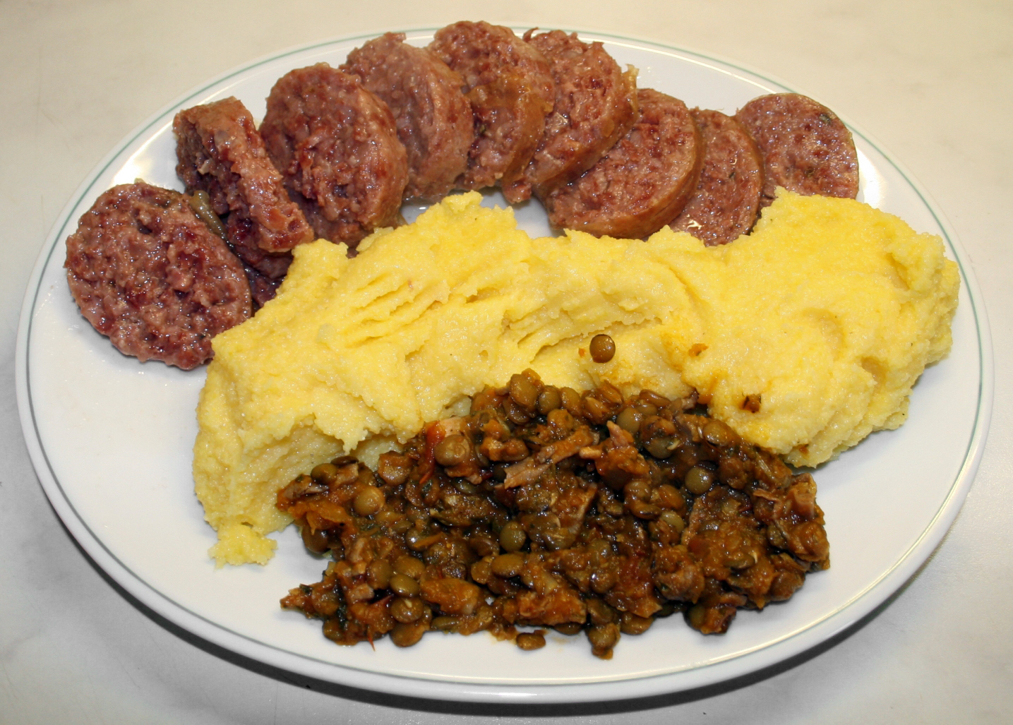 Antipasto di Polenta (Polentasandwich met mozzarella en parmaham)